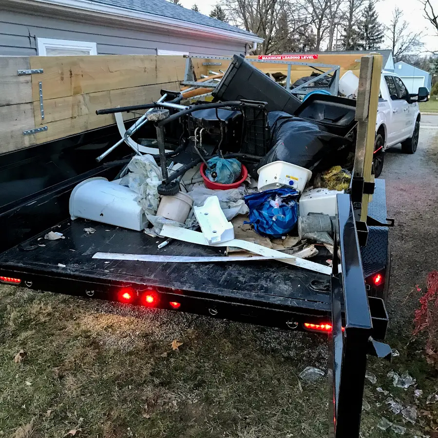 Roll-off dumpster delivered to a residential driveway in Sidney